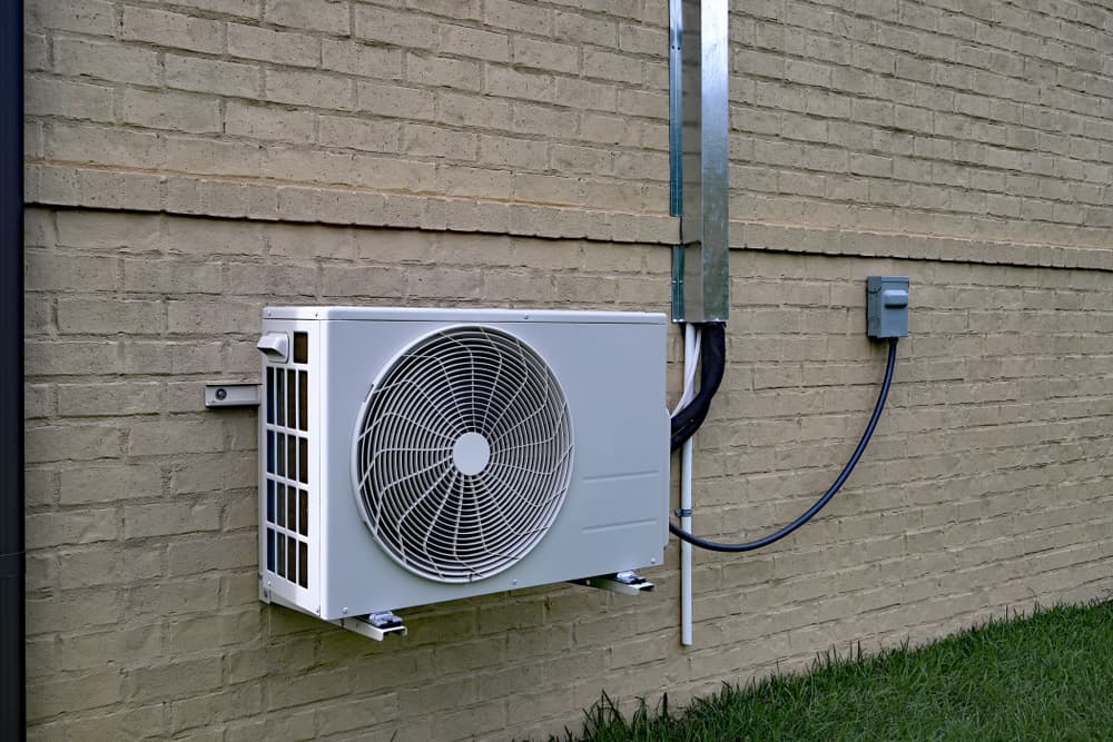 Outdoor air conditioner compressor — Instachill in Gold Coast, QLD