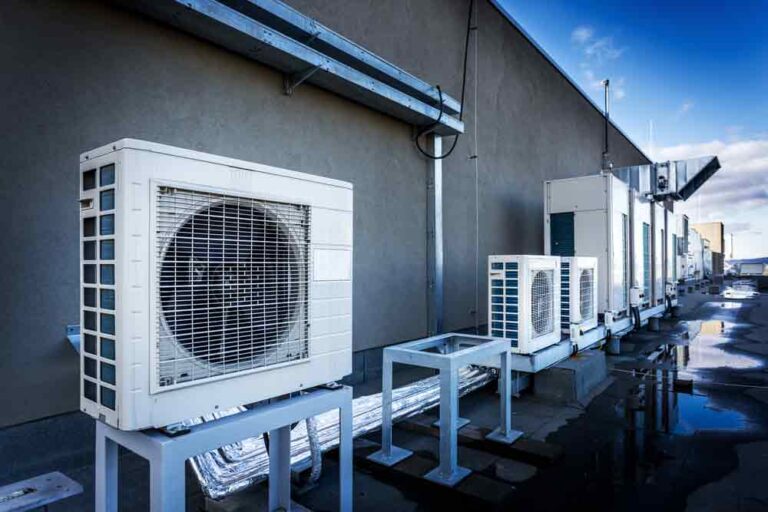 Air Conditioning Units On The Roof With Round Fan
