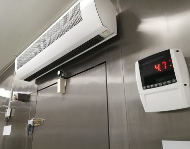 Air con installed outside walk-in freezer — Instachill in Runaway Bay, QLD